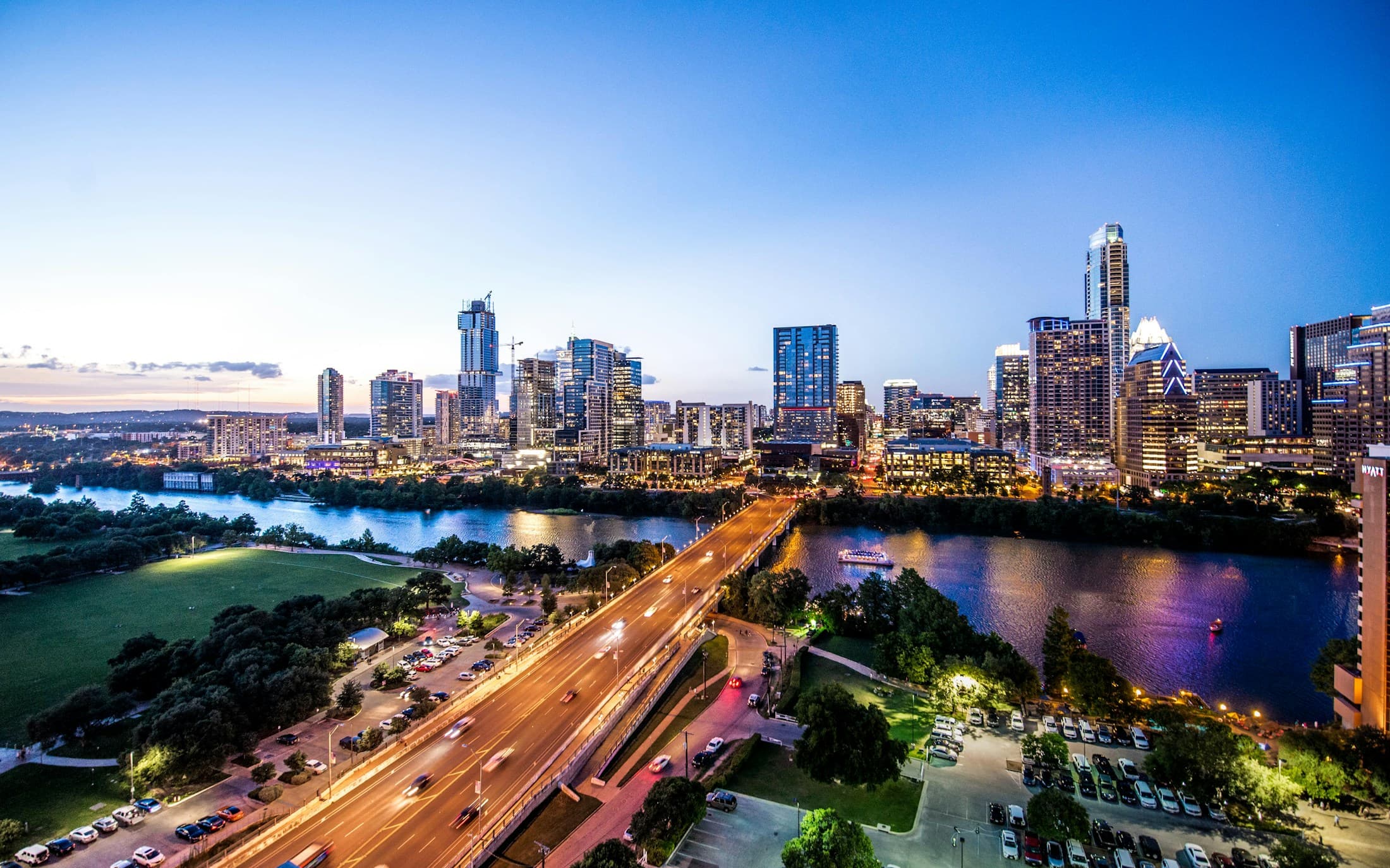 Austin's skyline and Lady Bird Lake at dusk